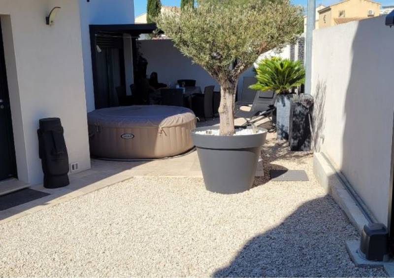 Modèles de piscines en bois hors-sol ou semi-enterrées